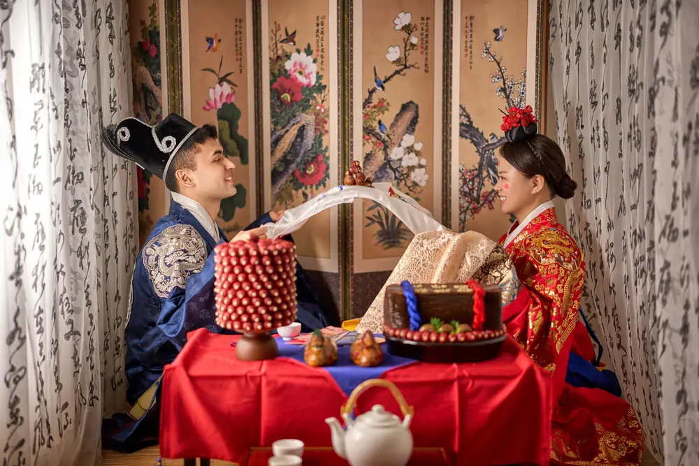 Ibrohim and Haniya sharing a traditional Korean wedding ritual
